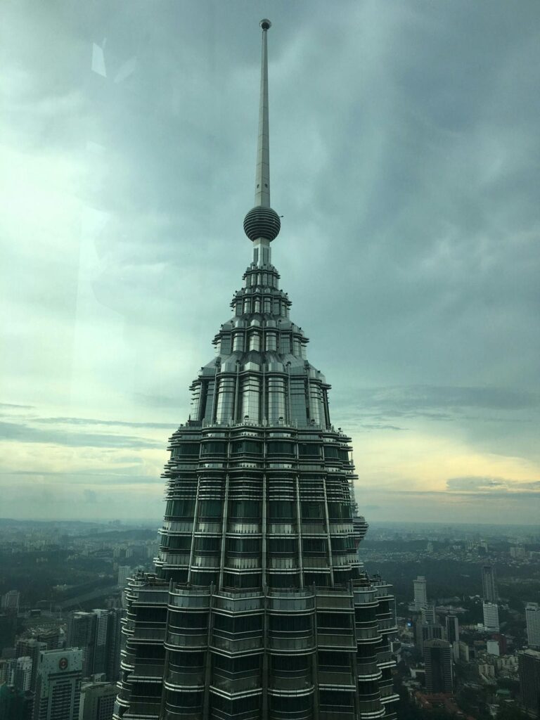 Architectural landmark: petronas twin towers top of the spire © judd sugay