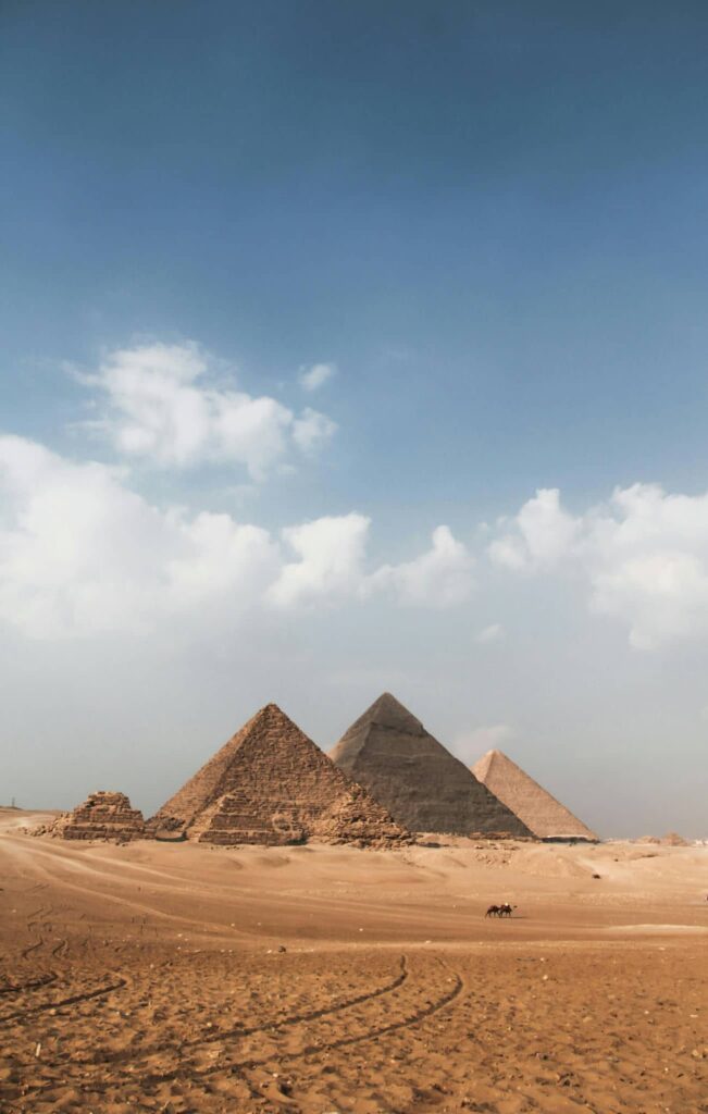 Architectural landmark: pyramids of giza far view © omar
