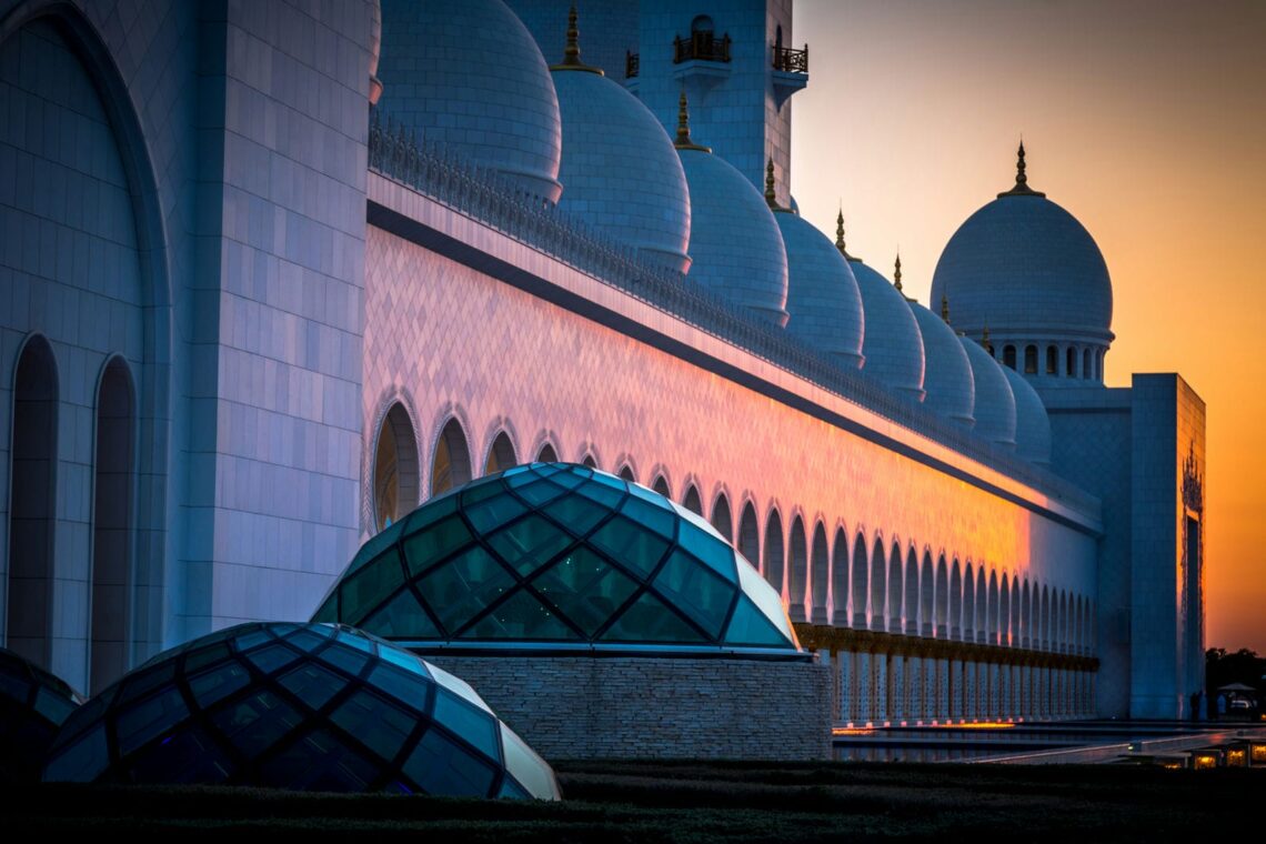 Architectural landmark: sheikh zayed grand mosque domes and sunset © greg meyer md(h)
