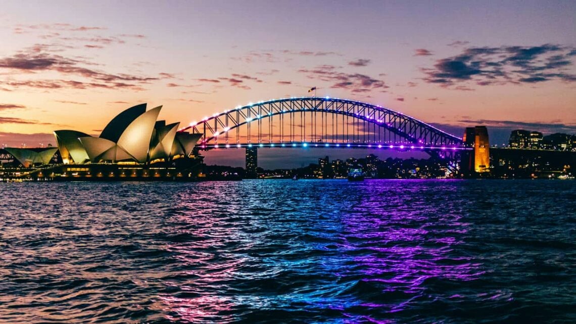 Architectural landmark: sydney harbour bridge illuminated opera house and harbour bridge © shakur muller