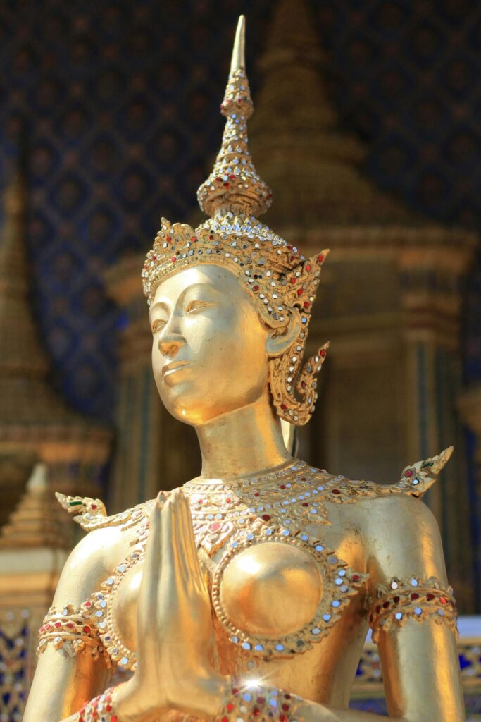 Architectural landmark: the grand palace golden statue of kinnari © rutpratheep nilpechr