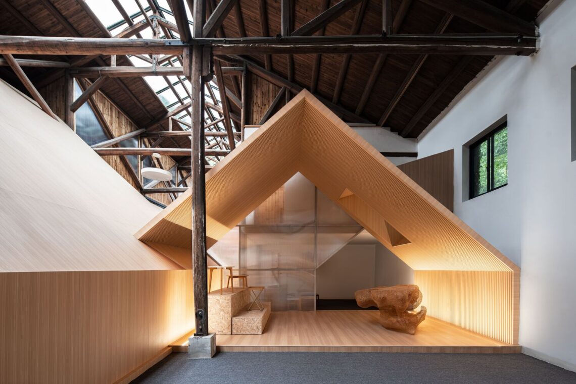 “warehouse within a warehouse” media center / ray&emilio studio