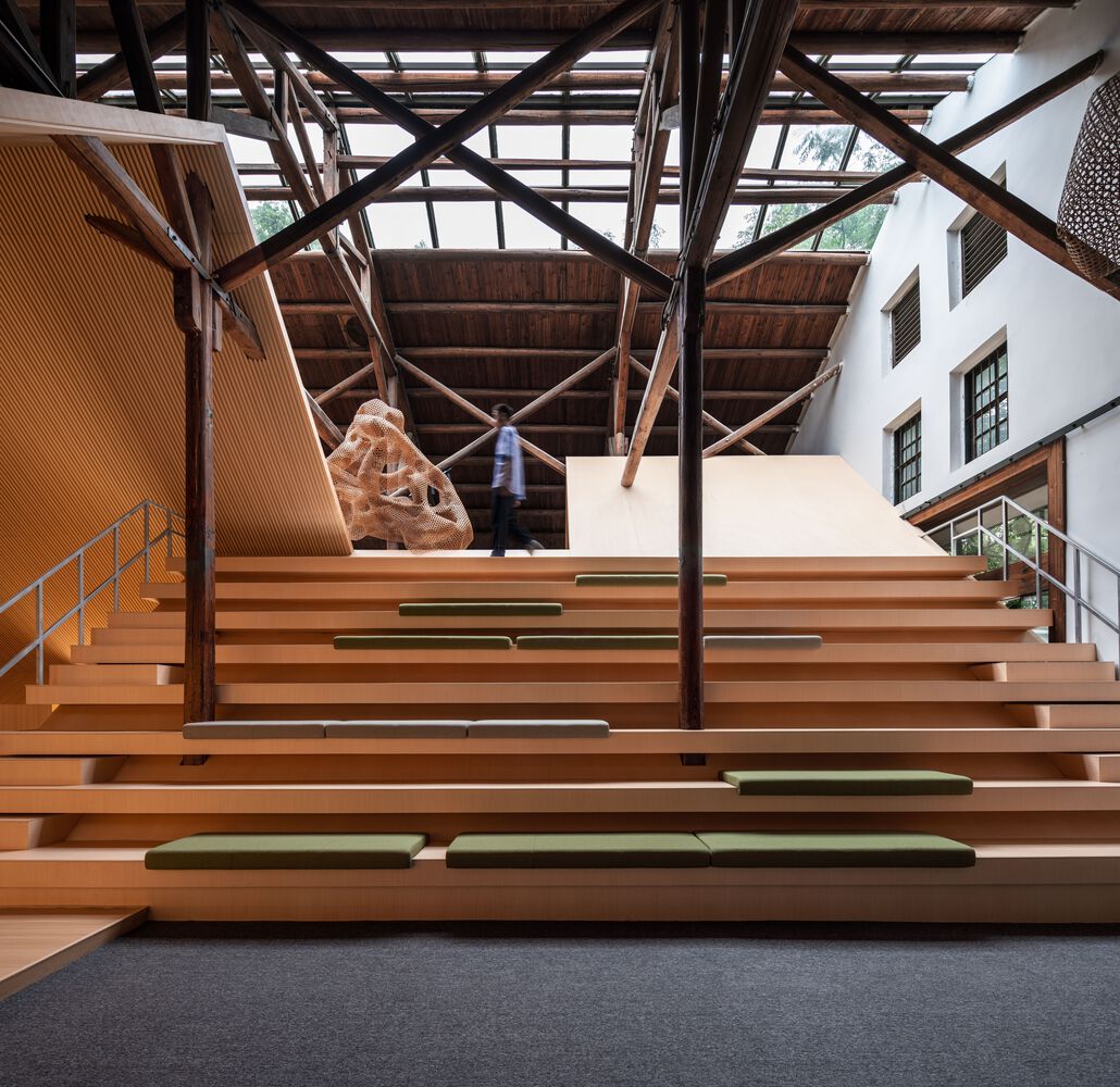 “warehouse within a warehouse” media center / ray&emilio studio