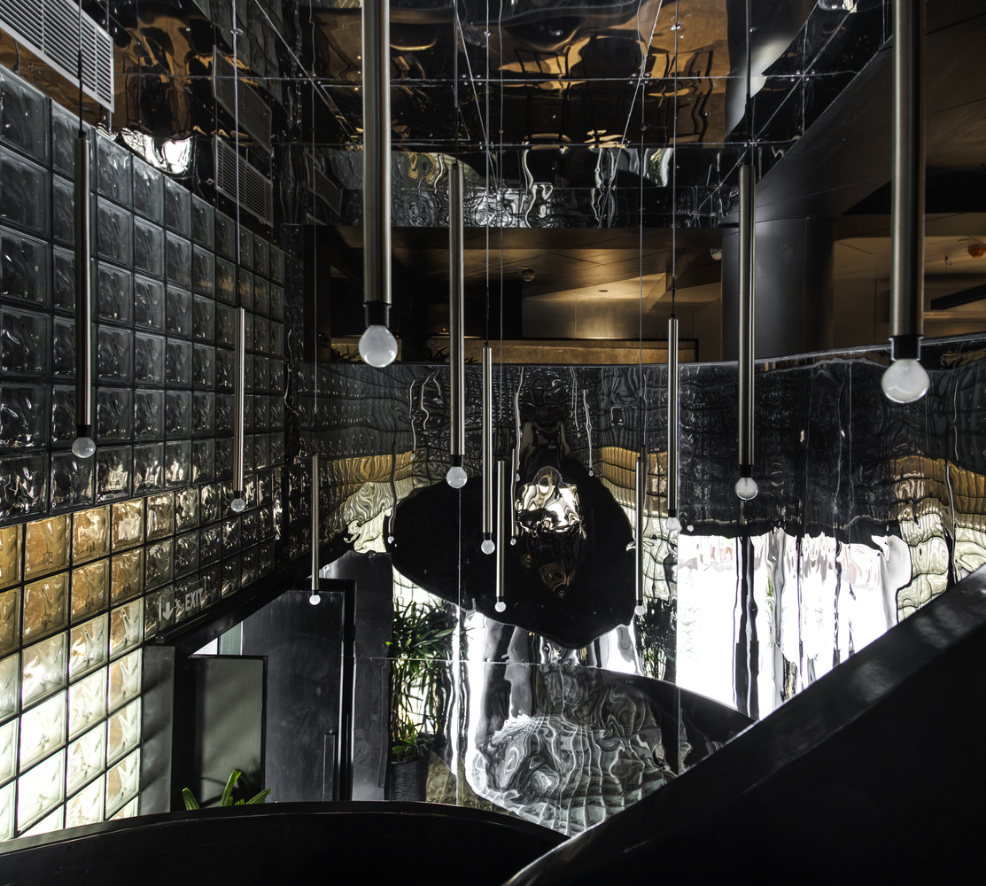 The black concrete restaurant and bar / renesa architecture design interiors studio