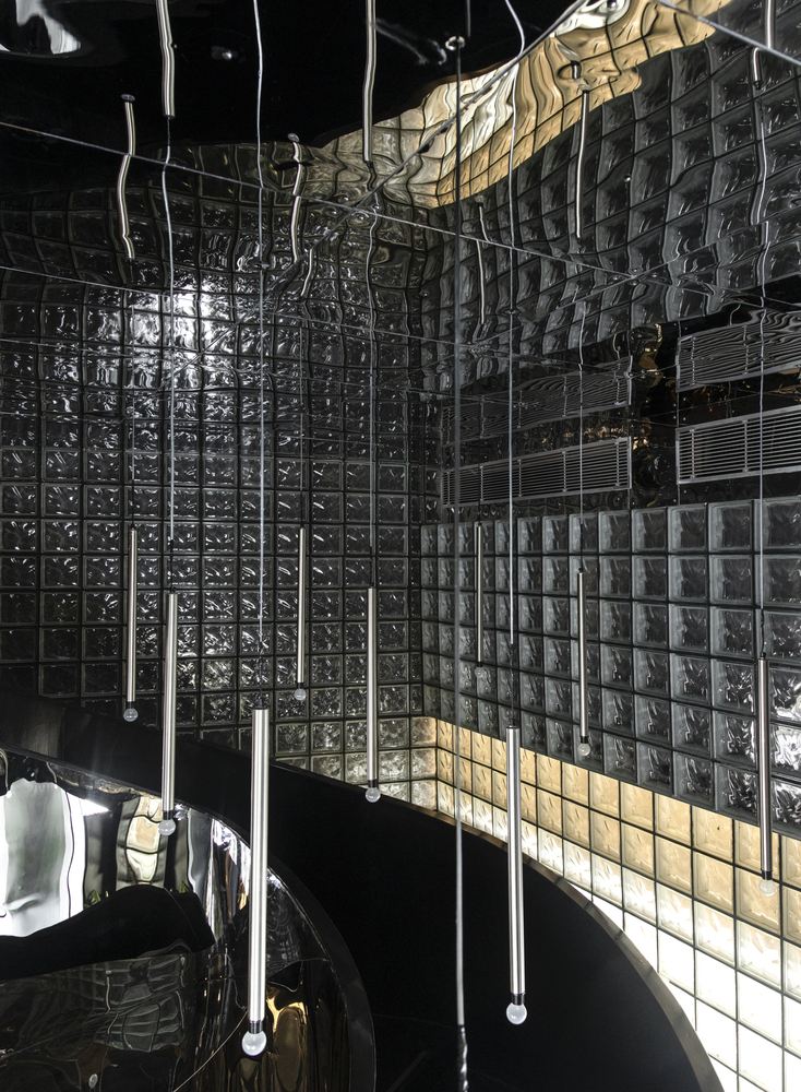 The black concrete restaurant and bar / renesa architecture design interiors studio