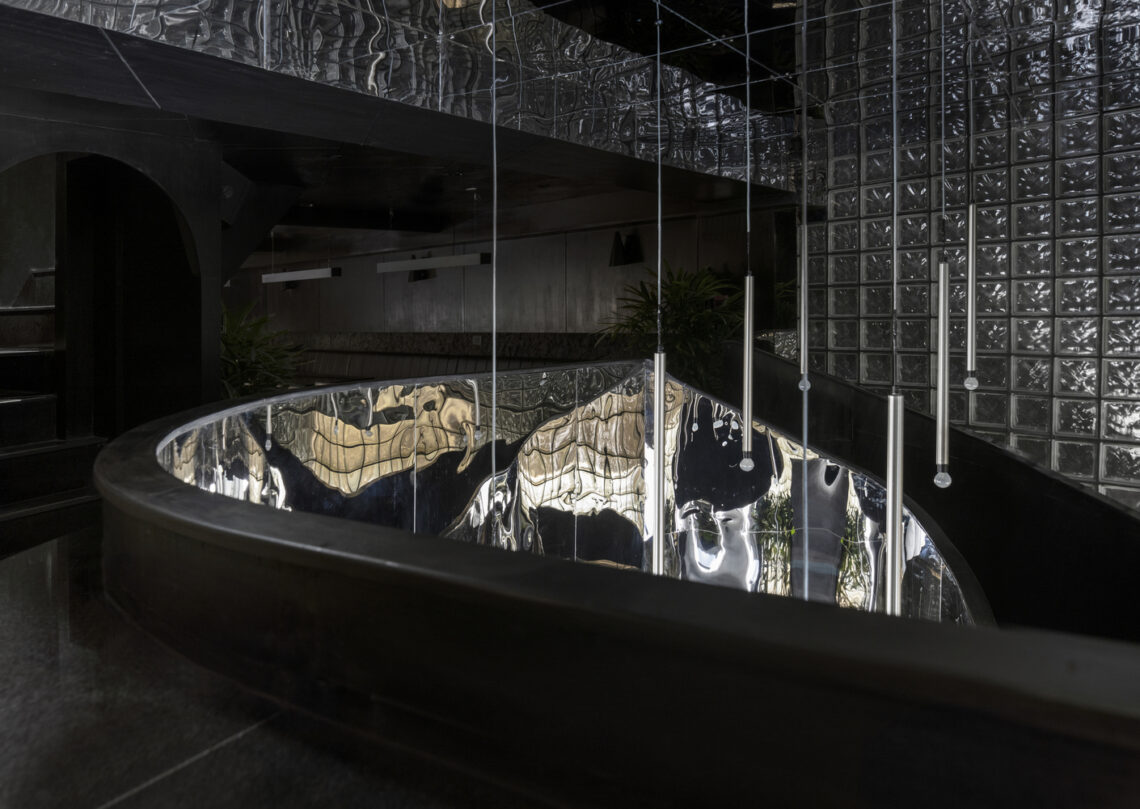 The black concrete restaurant and bar / renesa architecture design interiors studio