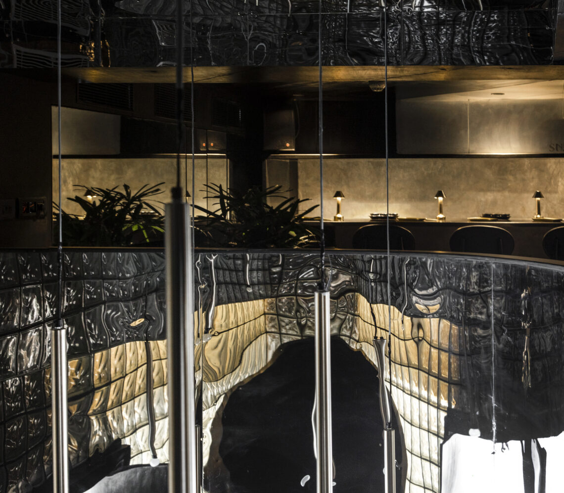 The black concrete restaurant and bar / renesa architecture design interiors studio