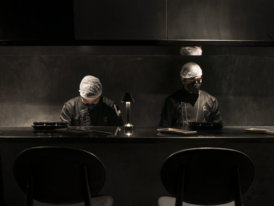 The black concrete restaurant and bar / renesa architecture design interiors studio