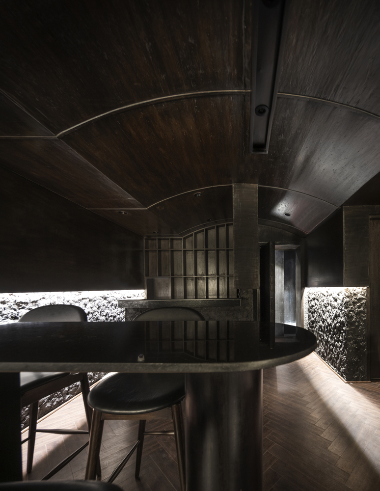 The black concrete restaurant and bar / renesa architecture design interiors studio