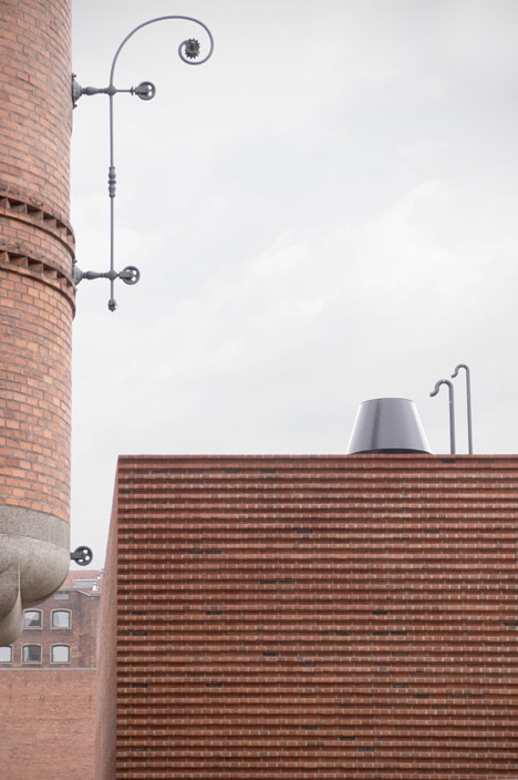 Gottlieb paludan adds four modern brick extensions to old industrial buildings