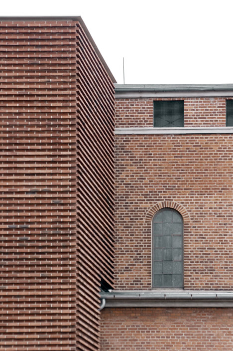 Gottlieb paludan adds four modern brick extensions to old industrial buildings