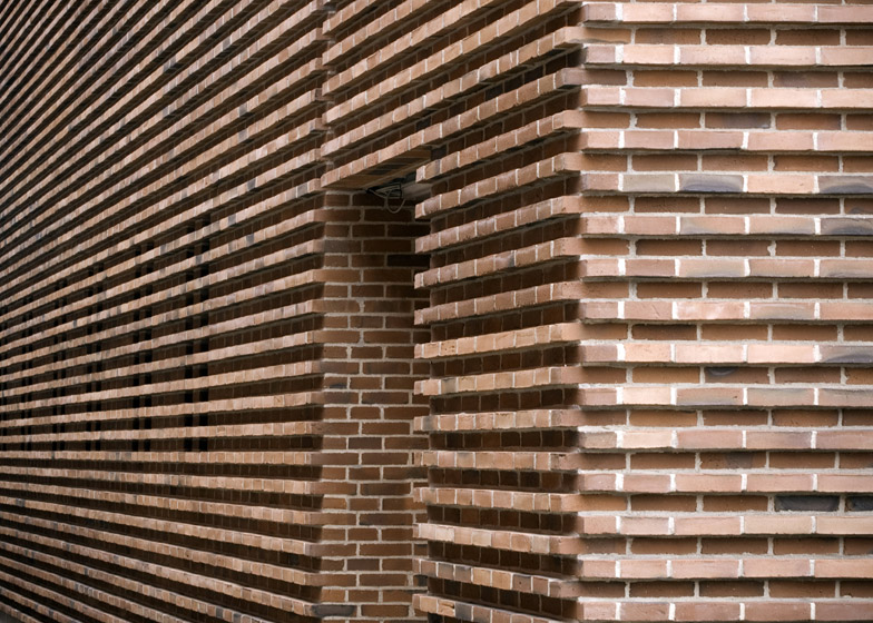 Gottlieb paludan adds four modern brick extensions to old industrial buildings