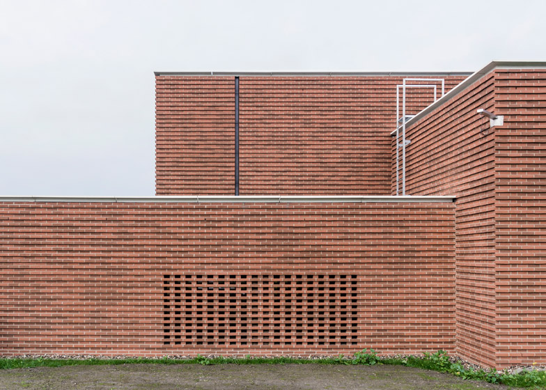 Gottlieb paludan adds four modern brick extensions to old industrial buildings