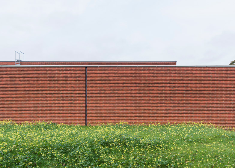 Gottlieb paludan adds four modern brick extensions to old industrial buildings