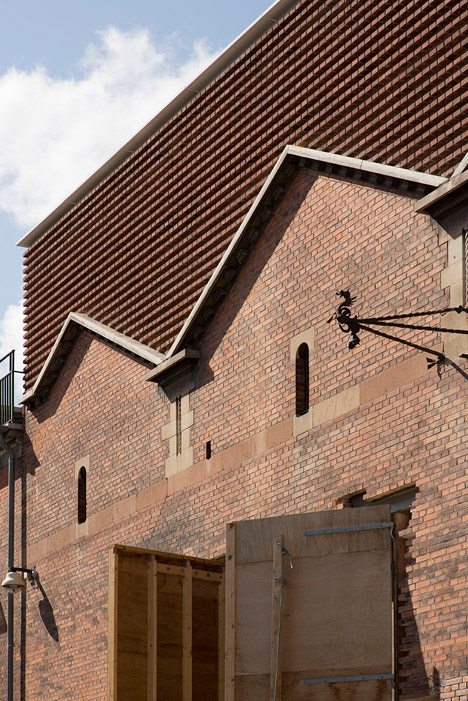 Gottlieb paludan adds four modern brick extensions to old industrial buildings