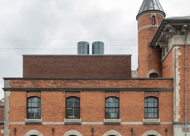 Gottlieb paludan adds four modern brick extensions to old industrial buildings