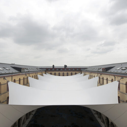 Covering of the courtyard of the carré des arts in mons / agwa + ney & partners