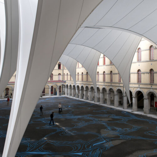 Covering of the courtyard of the carré des arts in mons / agwa + ney & partners