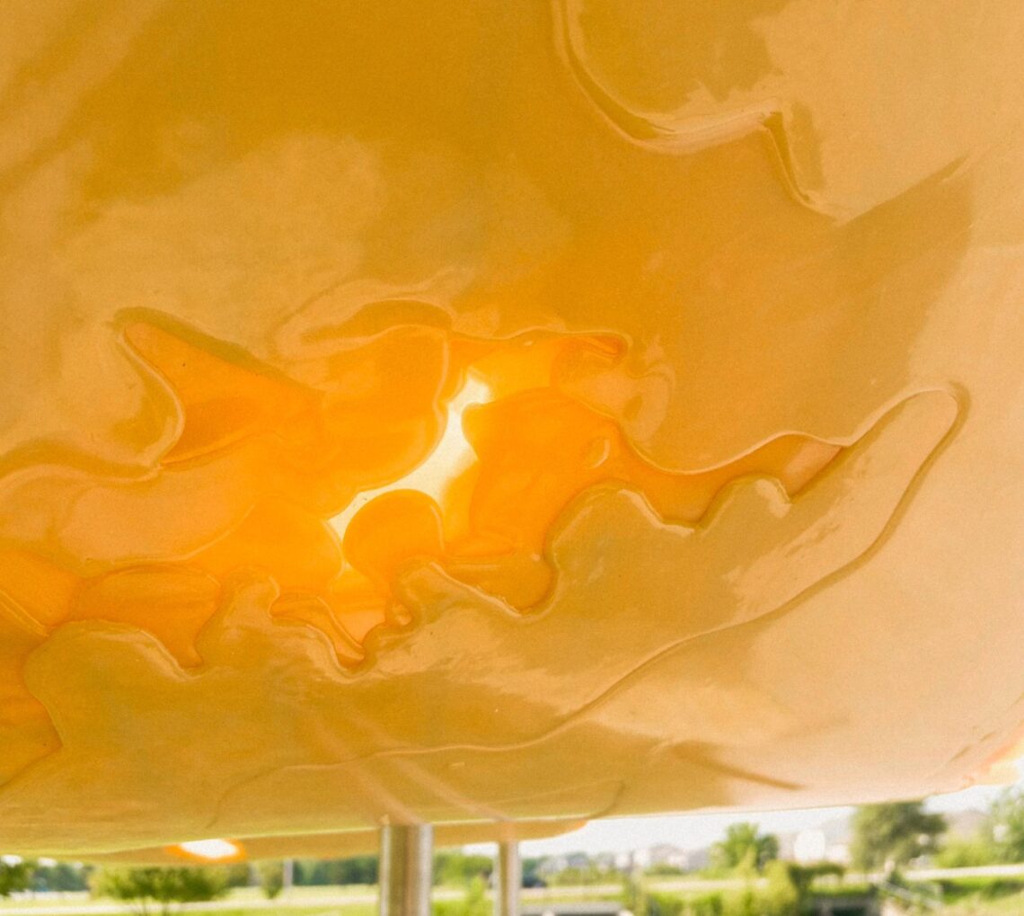 Puddle pavilion by i/thee turns algae bio-resin into public architecture along mud creek