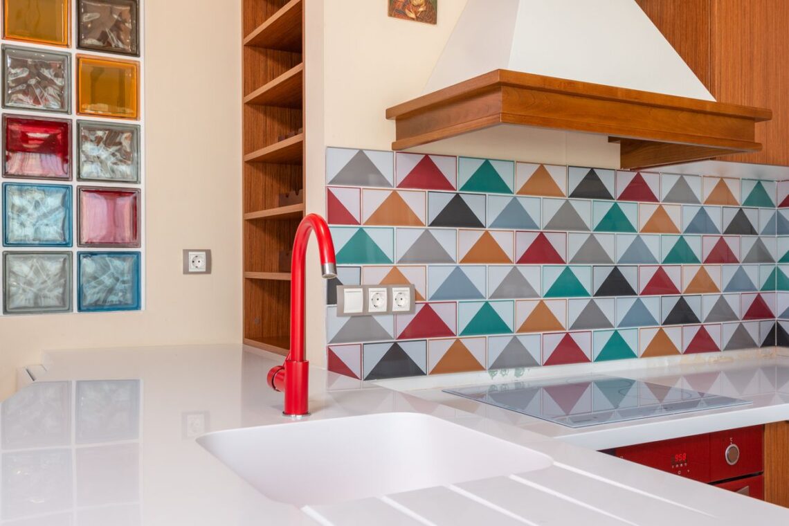 Edges and junctions decide whether a kitchen feels built into the house or assembled from separate products