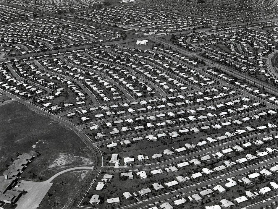 Levittown turned the detached house into a production problem using standardized plans materials labor sequences and financing structures to build suburbia at speed