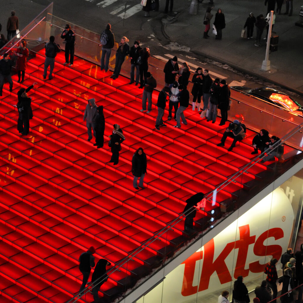 Structural glass public stair — tkts red steps